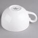 A Villeroy & Boch white porcelain tea cup with a handle.