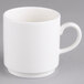 A Villeroy & Boch white porcelain mug with a handle on a gray surface.