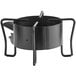 A black metal Backyard Pro outdoor stove with metal legs and two black metal handles.