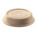 A beige plastic lid with a hole for a plate on a white background.