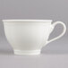 A close-up of a white Villeroy & Boch La Scala porcelain tea cup with a handle.