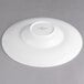 A white Villeroy & Boch porcelain deep plate with a small rim on it.