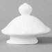 The lid for a white Villeroy & Boch porcelain teapot with a round top.