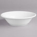 A Villeroy & Boch white porcelain bowl on a gray surface.