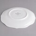 A white Villeroy & Boch porcelain saucer with a small rim.