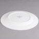 A white Villeroy & Boch porcelain flat plate with a white rim.