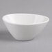 A white Villeroy & Boch porcelain bowl on a gray surface.