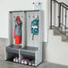 A grey Lifetime outdoor double locker with a backpack and shoes on hooks.
