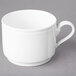 A close-up of a Villeroy & Boch white porcelain cup with a handle.