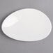 A white Villeroy & Boch porcelain oval plate with a white rim.