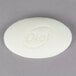 A white oval Dial soap bar with text on it.