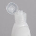 A white plastic bottle of Dial Restore hand and body lotion with a white cap.