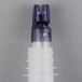 A close-up of a Thunder Group clear and purple liquor pourer with a white plastic connector.