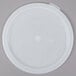 A white plastic lid for a Cambro round food storage container.