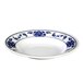 A white melamine soup plate with blue flowers on it.