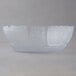 A clear polycarbonate bowl with a pattern on it.