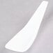 A close-up of a Fineline Tiny Temptations white plastic spoon.