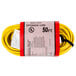 A yellow 50 ft extension cord in a package.