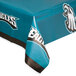 A blue plastic table cover with the Philadelphia Eagles logo in blue and black.