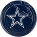 A blue Creative Converting paper dinner plate with a star design and the Dallas Cowboys logo.