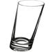 A clear Libbey slanted beverage glass on a white background.