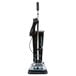 A Lavex upright bagged vacuum cleaner with a black handle.