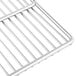 A stainless steel Cooking Performance Group Salamander oven rack with a handle.