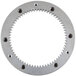 A circular metal turning plate gear with many holes.