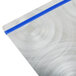 A Menu Solutions Alumitique aluminum menu board with blue bands on a metal surface.