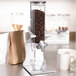 A Zevro SmartSpace dry food dispenser filled with coffee beans.