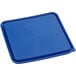 A blue square polypropylene lid on a table.
