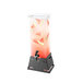 A black matte pyramid riser with a beverage dispenser filled with watermelon slices.