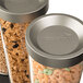 The Rosseto EZ-SERV cereal dispenser with cereal in a container.