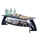 A table with food and drinks on a black matte Rosseto Opera House multi-level riser.
