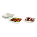 Three white Rosseto porcelain square bowls filled with salad and vegetables.