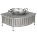 A Vollrath wire grill with a large bowl on top.