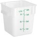 A white translucent square plastic container with green measurements.