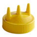 A yellow plastic Vollrath Tri Tip bottle cap with three wide pointy tips.