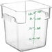 A clear square polycarbonate food storage container with measurements in green.