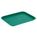 A teal plastic fast food tray on a white background.