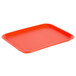 A red plastic Choice fast food tray with a handle.