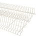 A white wire rack with many rows of wire shelves.