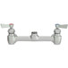 A silver Fisher wall mount faucet base with swivel stems and lever handles.