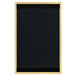 A black rectangular wood menu board with top and bottom yellow wood strips.
