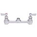 A Fisher stainless steel faucet base with swivel stems, swivel outlet, and lever handles.