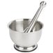 A Fox Run stainless steel mortar and pestle set. A silver stainless steel mortar and pestle.