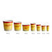 A row of yellow and red Carnival King popcorn cups with white lids.