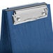 A close-up of a blue Menu Solutions wood clipboard with a silver clip.