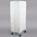 A white Curtron Supro breathable mesh bun pan rack cover.