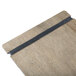 A Menu Solutions weathered walnut wood menu board with black rubber band straps.